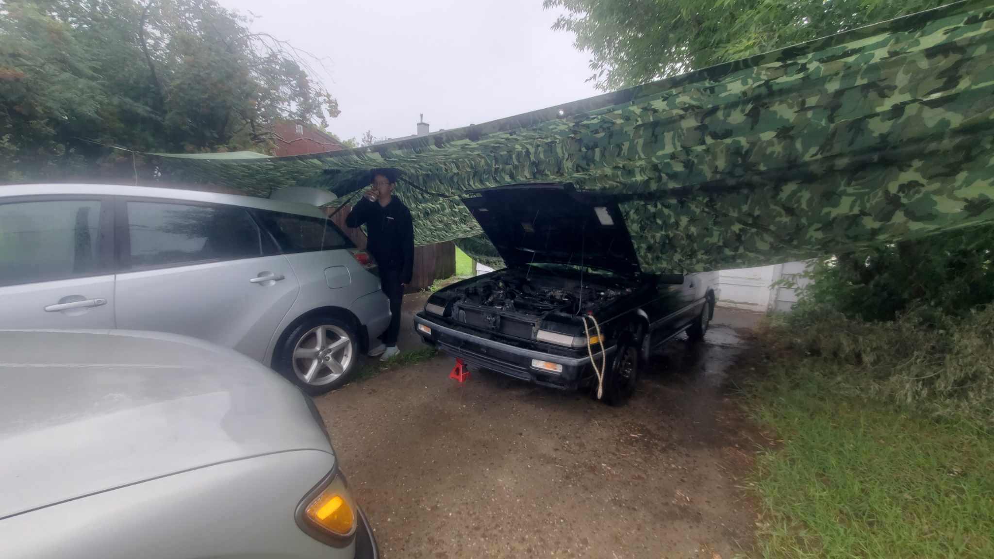 Transmission Removal Improvised on Driveway