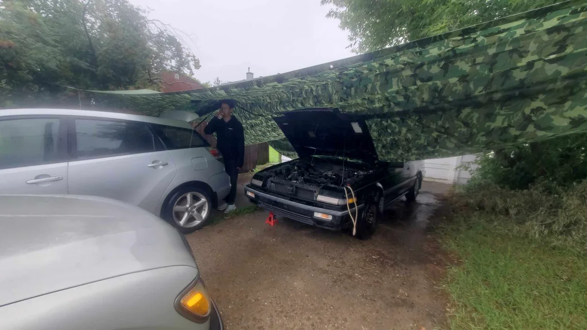 Transmission Removal Improvised on Driveway